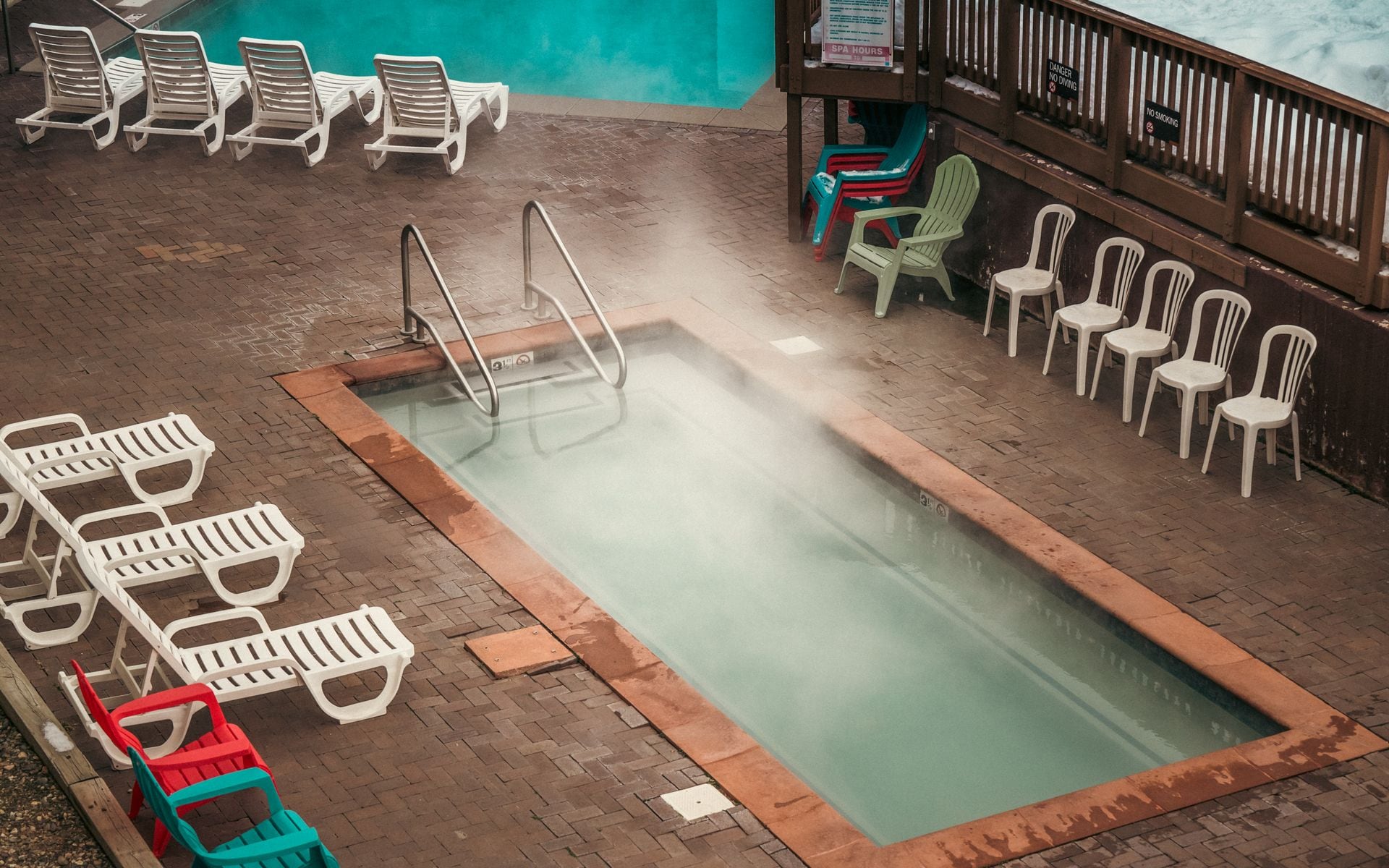 Outdoor hot spring pool at Chico Hot Springs Resort in Paradise Valley, Montana, with the Absaroka Range in the background