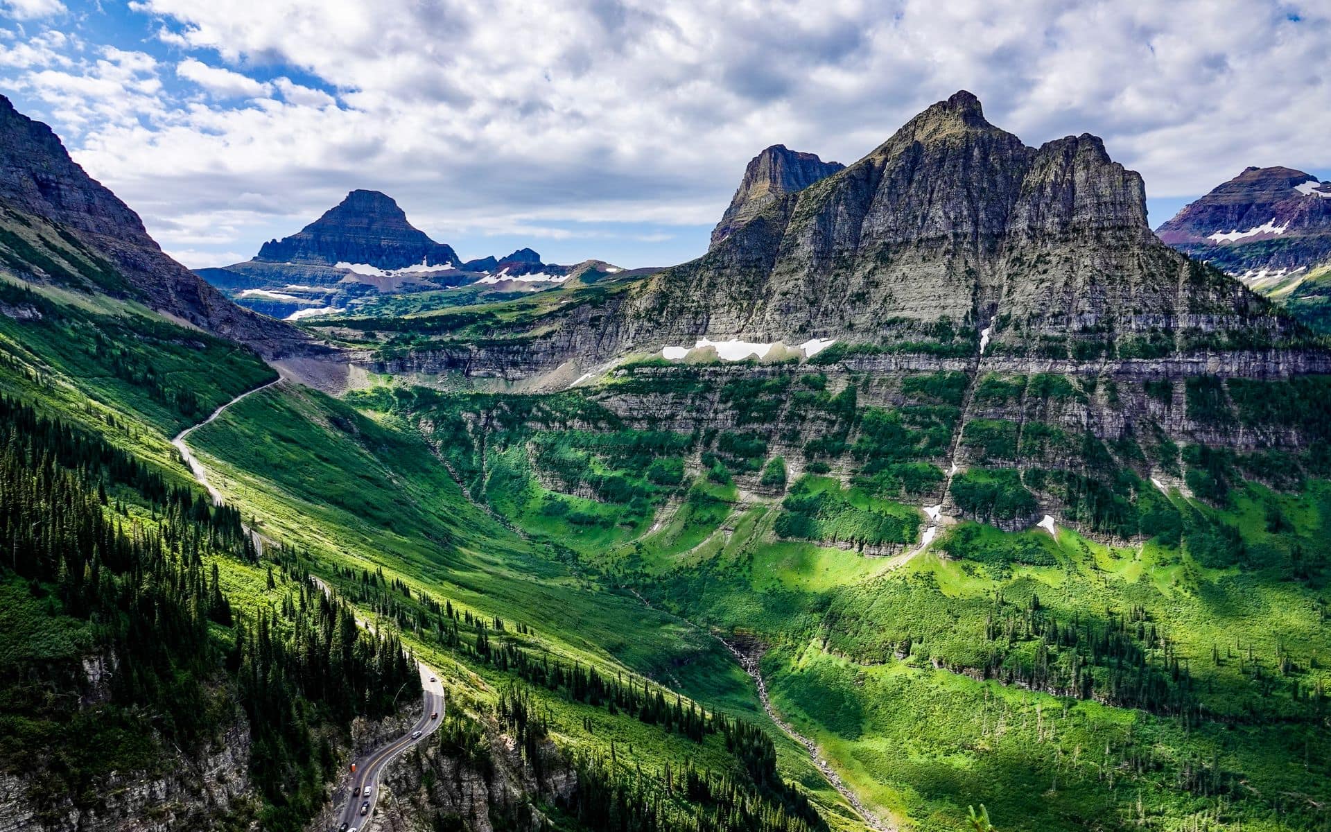 Mountains reflected in an alpine lake in Glacier National Park, Montana